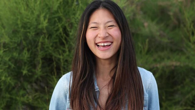 portrait of a young asian woman smiling