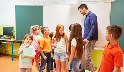 Group of students with teacher in classroom