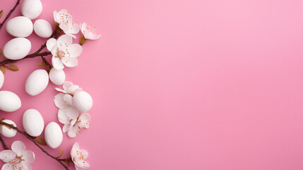 Fototapeta na wymiar A branch with white eggs and pink flowers on a pink background