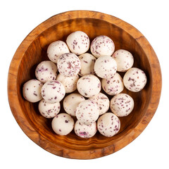 Kurt cheese with basil.  Kurt -  traditional Central Asian cheese. Small hard white cheese balls in wooden bowl isolated on white. Salty dairy snacks. Top view.