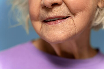 Close up of cropped senior woman wearing t-shirt