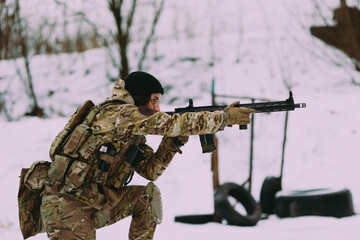 Military training. People training in tactical shooting.