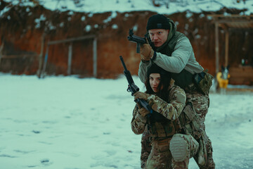 Military training. People training in tactical shooting.