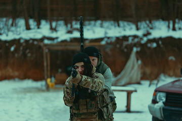 Military training. People training in tactical shooting.