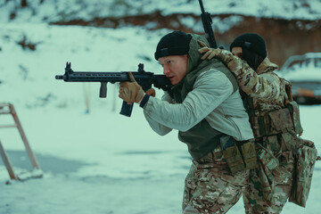 Military training. People training in tactical shooting.