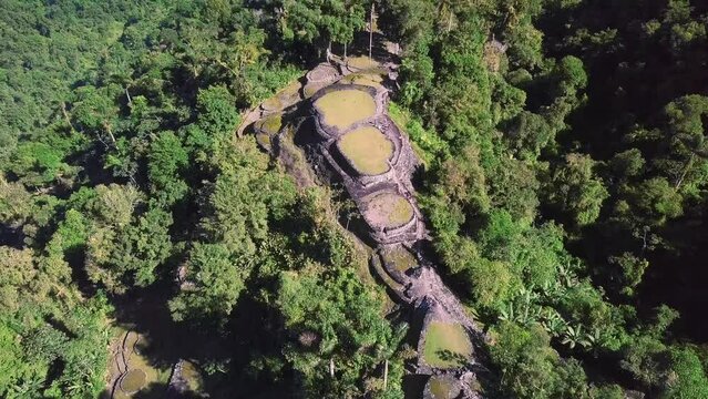 Hidden ancient ruins of Tayrona civilization Ciudad Perdida in the heart of the Colombian jungle. Aerial view from above. Lost city of Teyuna. Santa Marta, Sierra Nevada mountains, Colombia wilderness