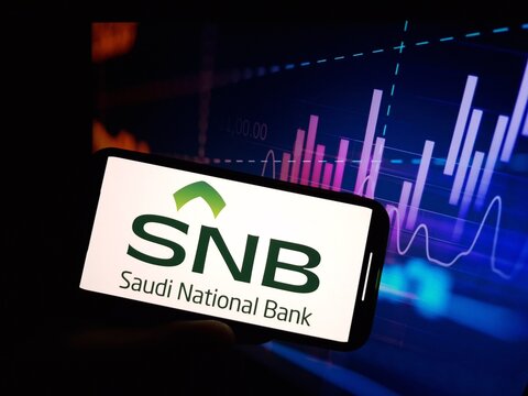 Konskie, Poland - January 07, 2024: The Saudi National Bank company logo displayed on mobile phone screen