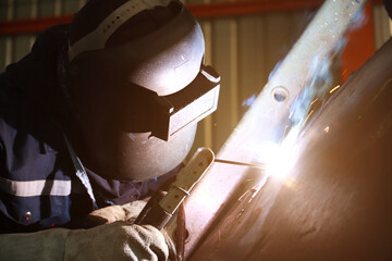 Steel welder builds technical, industrial steel welder in technical factory