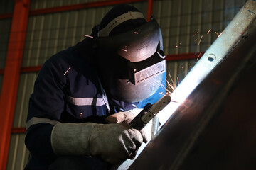 Steel welder builds technical, industrial steel welder in technical factory