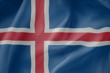 Iceland waving flag close up fabric texture background