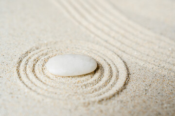 Stone Zen Japanese garden on sand round circle, Symbol of meditation still life and peaceful...
