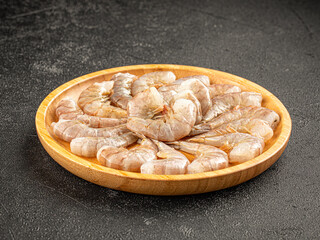 Portion of fresh raw shrimp on a plate