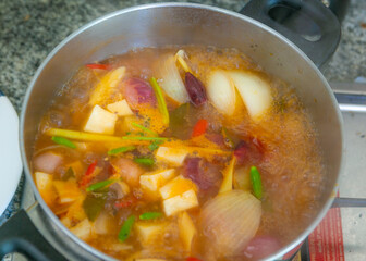 Tom Yum soup is boiling in the pot. Thailand favorite food. sour and spicy soup local food of Thailand