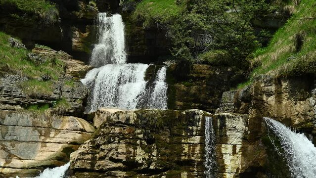 View on the middle part of a threefold waterfall