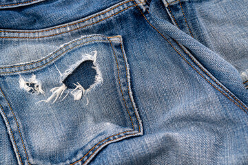 Fototapeta premium 破れたポケットのデニムジーンズ