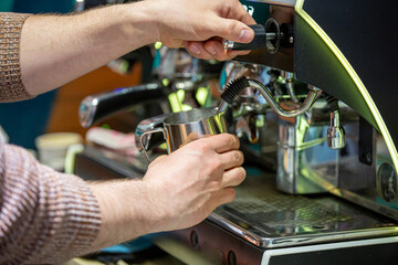 Barista coffee service concept.Barista women using coffee machine to make coffee in cafe