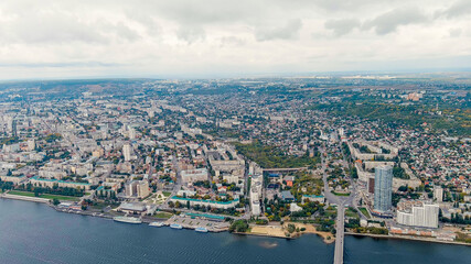 Fototapeta na wymiar Saratov, Russia. Panorama of the city of Saratov in cloudy weather, Aerial View