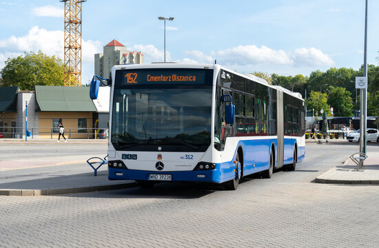 Mercedes-Benz Conecto G articulated bus at Dworzec autobusowy Cracow Czyżyny bus station. Autobus in service for Mobilis company and MPK Kraków Public Transport on September 22, 2023 in Krakow, Poland