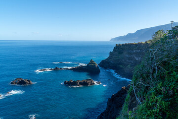 Waves crashing at the harsh coast line of Madeira 