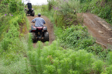 Asian man playing ATV Ride Adventure Tour in Malang, Indonesia