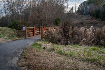 Bridge crossing near the Tega Cay golf course off of the Trailhead Park hiking trail in Tega Cay, South Carolina.