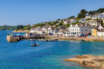 St Mawes, Roseland Peninsula, Cornwall, UK - The popular village of St Mawes. St Mawes Castle can be seen, and also the similar one across the River Fal, both built by Henry VIII to defend the harbour - obrazy, fototapety, plakaty