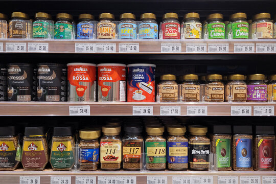 PENANG, MALAYSIA - 1 DEC 2023: Jaya grocery store in Penang displays a variety of both local and imported brands of instant coffee and flavored coffee on its store shelves.