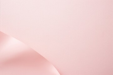  a close up of a pink wall with a curved corner on the left side of the wall and a white corner on the right side of the other side of the wall.