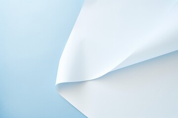  a close up of a white sheet of paper with a light blue back ground and a light blue back ground with a light blue back ground and a light blue back ground.