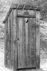 Old wooden outhouse.