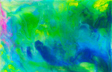 Obraz na płótnie Canvas Bright colorful acrylic texture. Liquid flowing acrylic on canvas. Marble texture in rainbow colors. Hand made abstract artwork with pink, blue, green and yellow colors.