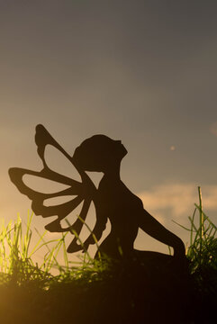 silhouette of a girl fairy