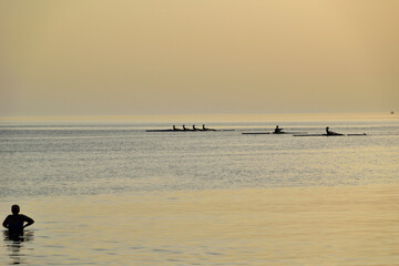 rowing (skiff) at sunset - Paralia Richa Nera (beach), Myrina, Lemnos island, Greece, Aegean sea