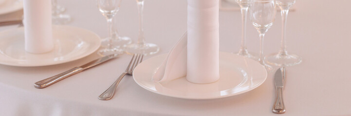 Three empty glasses for alcoholic beverages of vodka, wine and champagne are on the table. Banner with copy space.