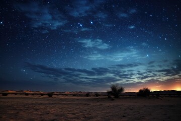 This image shows a breathtaking view of the night sky adorned with countless stars and wisps of clouds., A starry night sky over a calm desert landscape, AI Generated