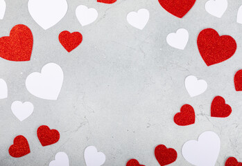 Valentine's Day concept. Valentine's Day background. Gifts, candles, confetti, envelope - postcard on a marble background. Flatley, top view, copy space.Valentine's day celebration