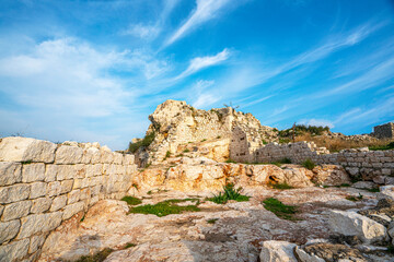 Fototapeta na wymiar Elaiussa Sebaste or Elaeousa Sebaste was an ancient Roman town in Mersin, was founded in the 2nd century BC on a tiny island attached to the mainland by a narrow isthmus in the Mediterranea Sea.