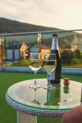Glasses of wine against the background of mountains. Selective focus.