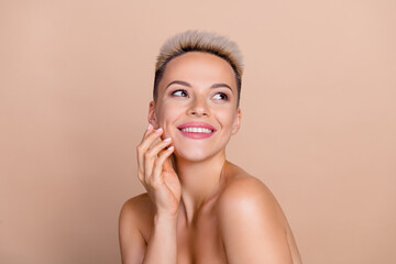 Photo of pretty happy girl touch cheeks applying new cream daily hygiene face lifting isolated pastel color background