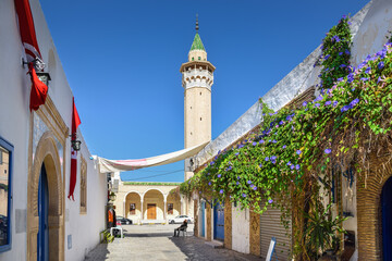 A street in Monastir in the background of the Bourguiba Mosque, Tunisia