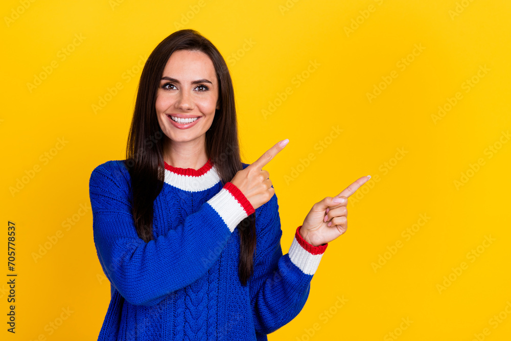 Sticker Photo of satisfied mature age woman brunette hair hispanic model in blue jumper direct fingers mockup isolated on yellow color background