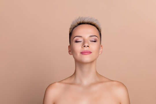 Photo of pretty girl beautician client close eyes wait for base foundation makeover isolated pastel color background