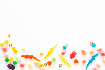 Colorful candies and gummies jelly background. Sweet food and candies pattern