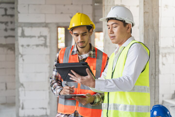 Client and Contractor discussing plan to renovation house.