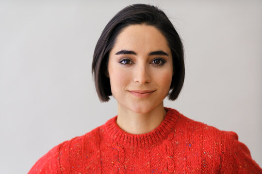 Latina woman looking at camera