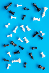 Black and white chess pieces, top view. Success and winning the competition concept