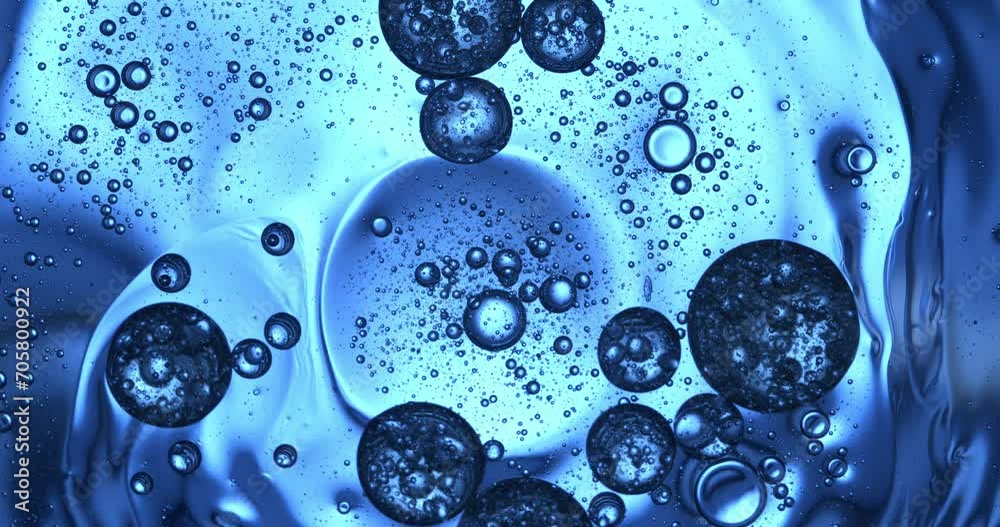 Wall mural slow motion macro of floating micro particles molecules in liquid are analyzed with microscope by ch