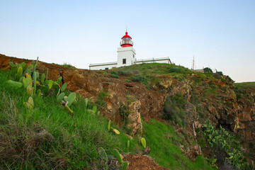 Fototapeta na wymiar Lighthouse of Ponta do Pargo on the western coast of Madeira island (Portugal) in the Atlantic Ocean