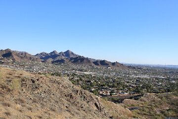 Aerial view of Valley of the Sun, Arizona capital city of Phoenix from North Mountain Park Hiking Trails in the Evening