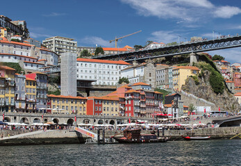 Overview of the Cais da Ribeira, the port district, with its colorful houses and cobbled streets,...